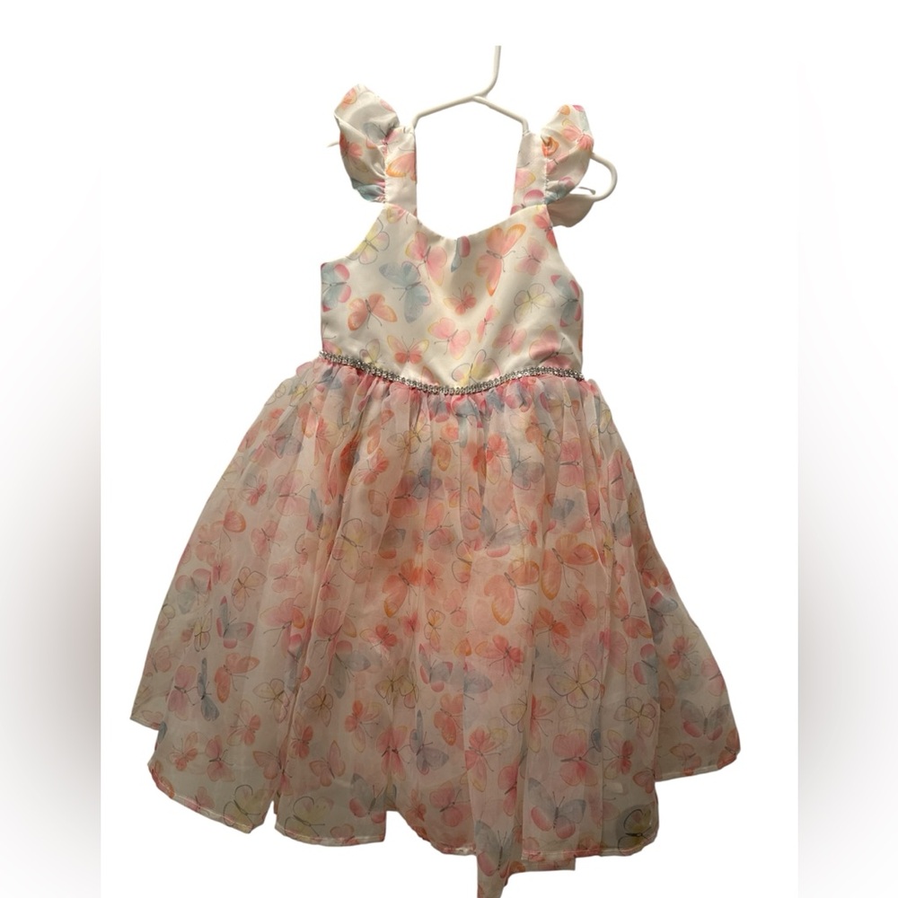 Beautiful ivory dress with a soft pastel butterfly print.